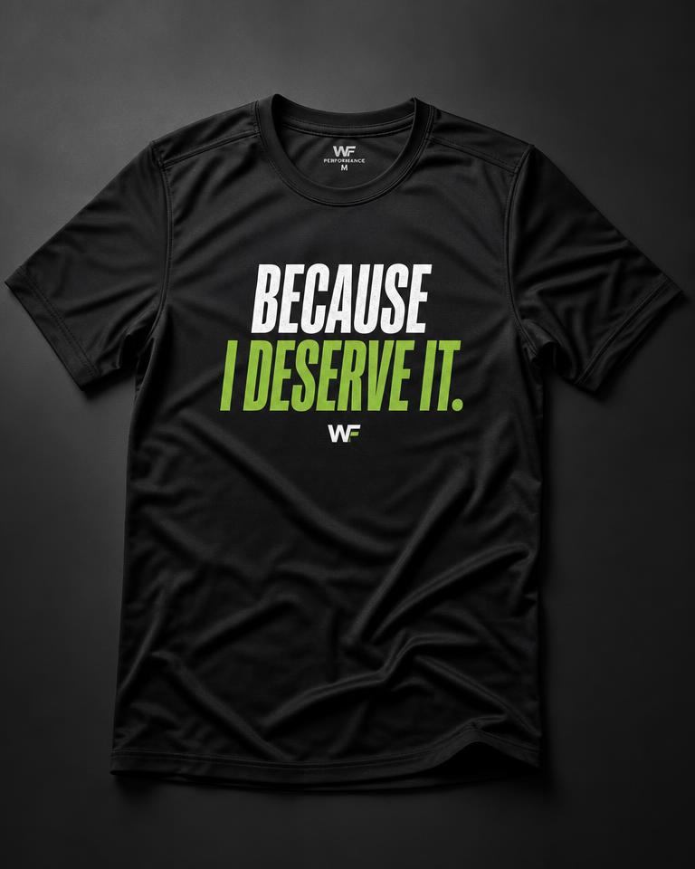 Black performance tee printed with the statement Because I Deserve It
